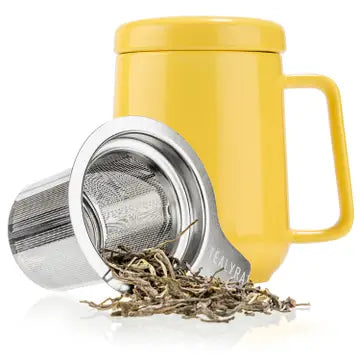 Yellow mug with a metal tea infuser