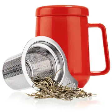 Red mug with a metal tea infuser 